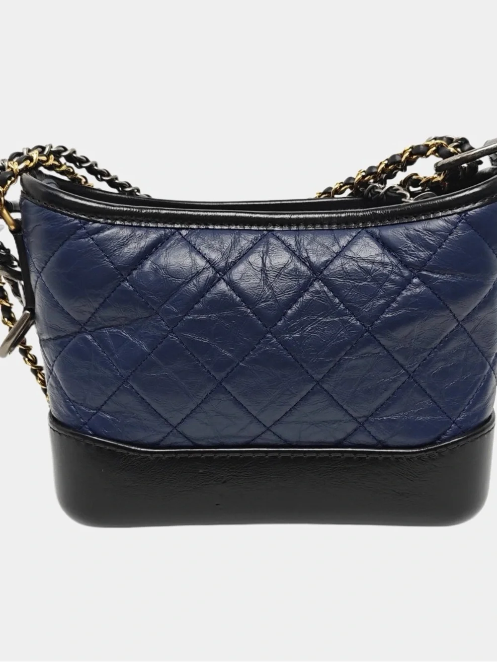CHANEL Quilted Navy Leather Shoulder Bag with Black Trim and Gold CC Charm